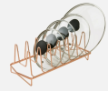 Pot lid holder is a kitchen organizing tool designed for storing pot LIDS. Available in stainless steel, plastic or iron to help keep the kitchen clean and efficient.