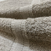 The material of a bath towel greatly influences its absorbency, softness, and overall feel.