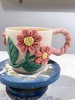 My love for ceramics stems from my awe and yearning for craftsmanship. Each cup is a unique story, from wet mud to dry finished products, I explore the infinite possibilities of shape and color with each drawing, repairing and glazing process.