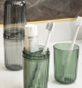Mouthwash cups are used to gargle and clean the mouth, usually made of plastic, glass or ceramic, with a simple design and moderate capacity to help improve oral hygiene.